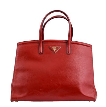 BOLSO DE PRADA
Cuero de vitello rojo. Correa extra