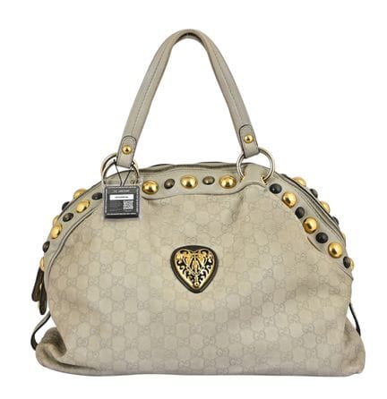 SAC À BANDOULIÈRE GUCCI VINTAGE
Cuir crème. Logo G