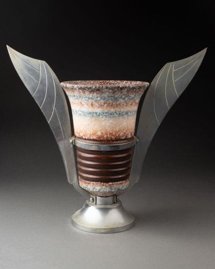 Art Deco work 
VASE on pedestal with two fins 
Cer