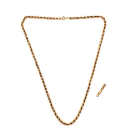 CHAINE torsadée en or jaune 18K. On joint un morce