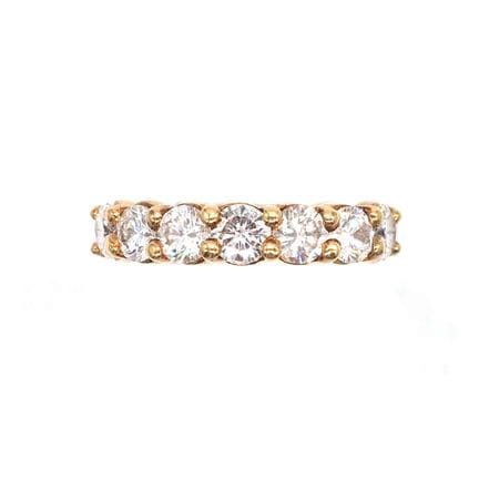 BAGUE demi-alliance en or jaune 18K, sertie de 7 d