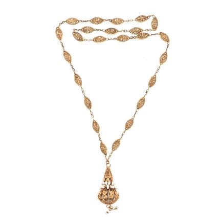 SAUTOIR composé d'une chaîne en or jaune 18K filig