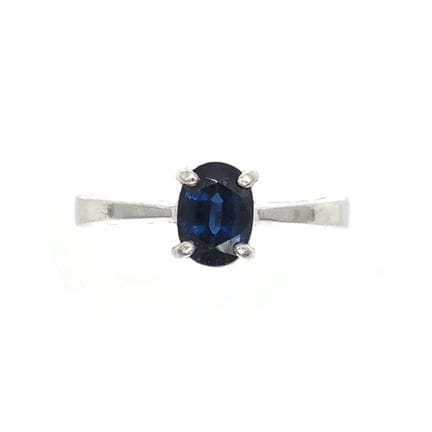 BAGUE en or gris 18K sertie d'un saphire bleu tail