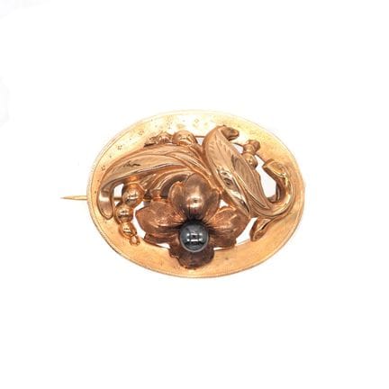 Antike Brosche aus Gelbgold, oval, mit Blumenverzi