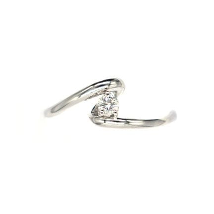BAGUE Solitaire en or gris 18K sertie d'un diamant