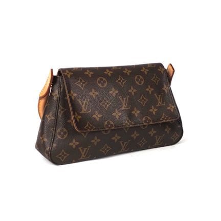 LOUIS VUITTON. Sac femme modèle Looping en toile M