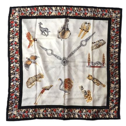 CARTIER. Foulard en soie modèle Horloge et animaux
