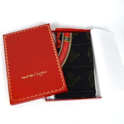 Must de CARTIER. Important foulard dans les colori