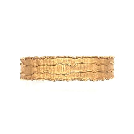 BRACELET jonc en or jaune 18K, orné de bandes ondu