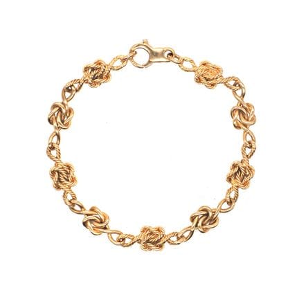 BRACELET en or jaune 18K, composé d’une alternance