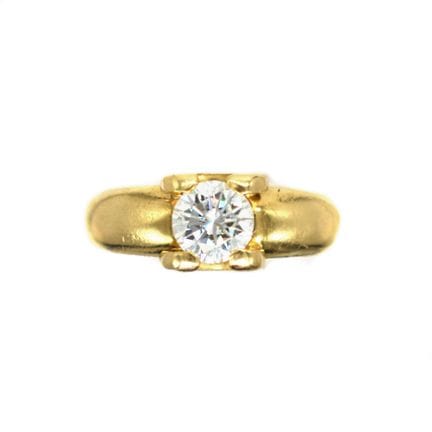BAGUE en or 18K ornée d'un diamant taille brillant