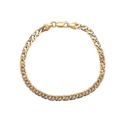 BRACELET en or jaune 18K à maille gourmette plate.