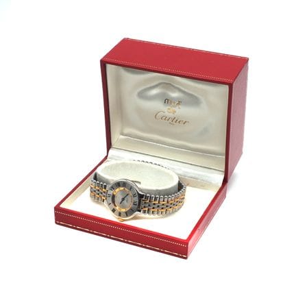CARTIER. Women’s wristwatch in steel and gold-plat