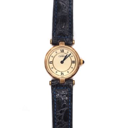 CARTIER. Must ladies' watch with a round, gold-pla