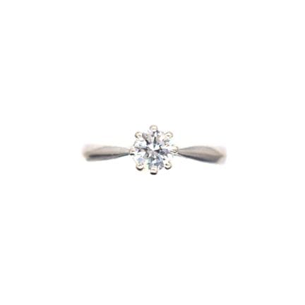 BAGUE solitaire en or gris 18K sertie d'un diamant