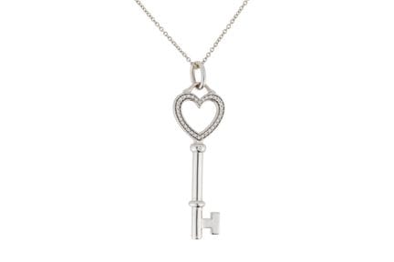 Tiffany &amp; Co: Colgante de llave de oro de 18 q