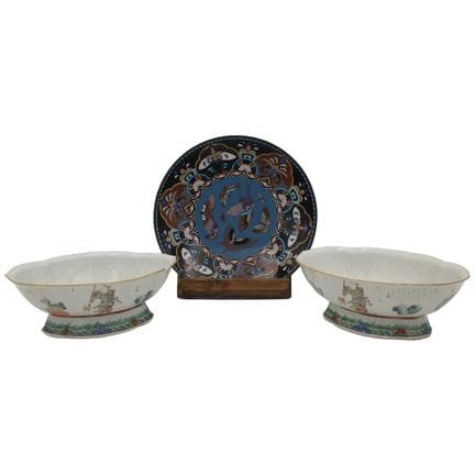 Two bowls and a plate. Polychrome porcelain with o