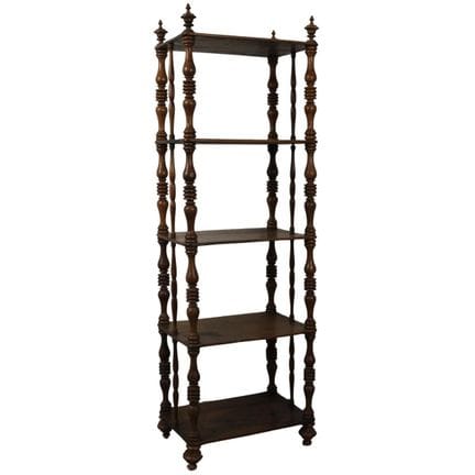 Five-shelf bookcase in walnut with carved columns.