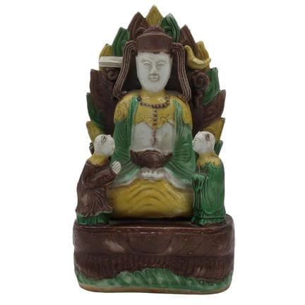 Polychrome porcelain figurine with ornamental moti