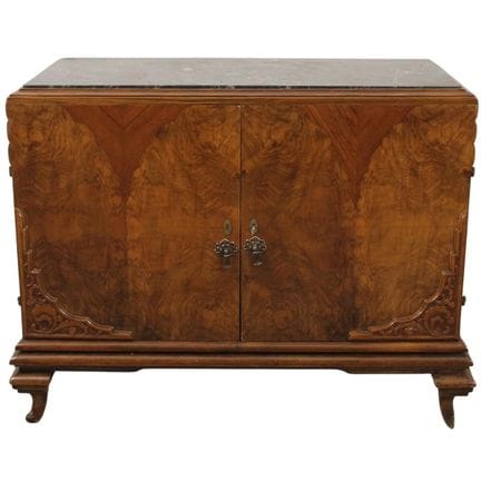 Two-door cabinet in walnut burl with carved orname