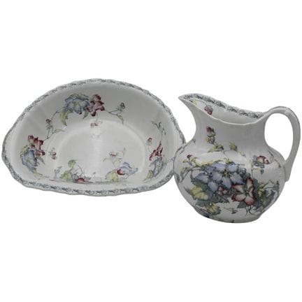 Jug and basin. Ceramic decorated with floral and p