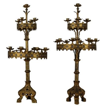 Pair of eclectic thirteen-light candelabra. Gilded