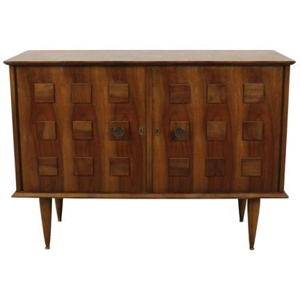Walnut sideboard with relief decoration featuring 
