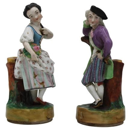 "Gentleman and Lady" Pair of small statues in anti