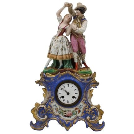 Antique porcelain clock with figures of commoners 