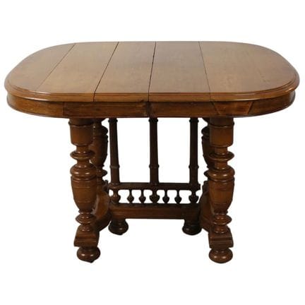Table à rallonge en chêne avec pieds sculptés. Fra