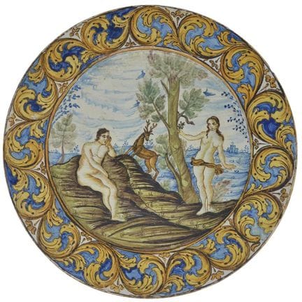 Assiette en majolique représentant Adam et Ève et 