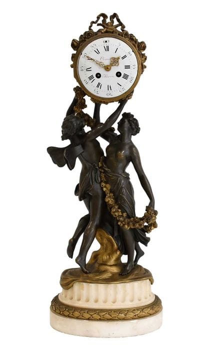 A French Figural Bronze and Marble Striking Mantel