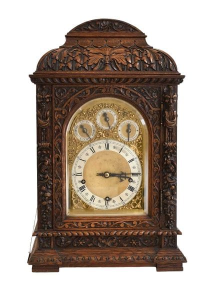 An Oak Carved Chiming Table Clock, circa 1890, the