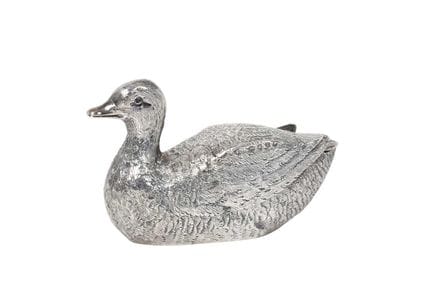 in the form of a duck, overall textured to simulat