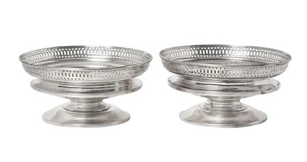 each tapering cylindrical and on spreading foot, w