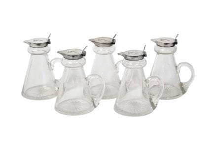 each tapering cylindrical and with plain glass loo