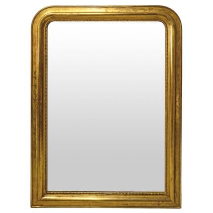 Miroir avec cadre doré à la feuille ciselée et mot