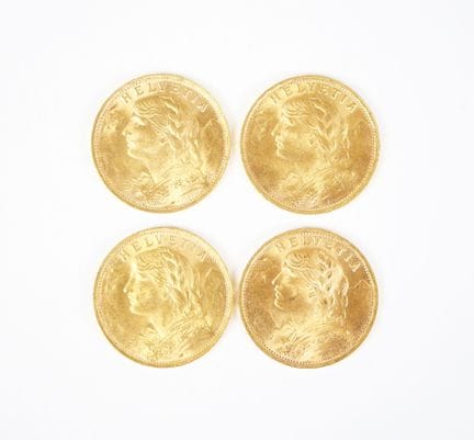 Set of four 20 Swiss franc gold coins, 1947.