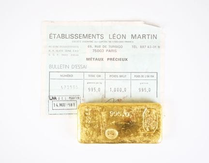 1 kg (995 g) yellow gold bar, numbered 473,965. 
A