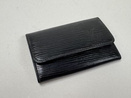 LOUIS VUITTON
Portachiavi in pelle nera e metallo 