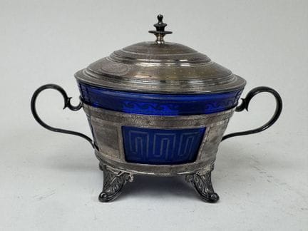 Covered sugar bowl made of colored crystal with ge