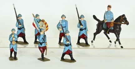 Eight soldiers in a parade, made of hollow lead fr
