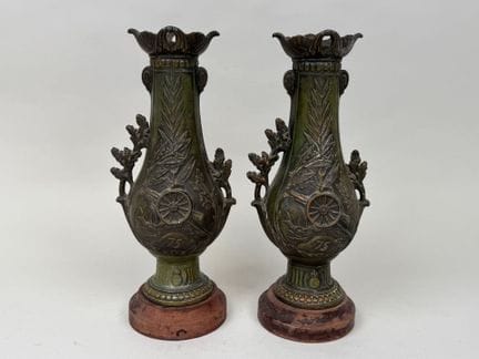 Pair of patinated and chiseled silver-plated vases