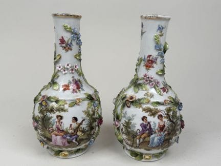 Pair of polychrome and gold porcelain vases with r