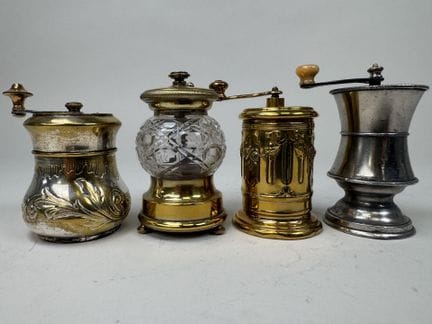 4 small pepper mills made of metal, pewter, and cu