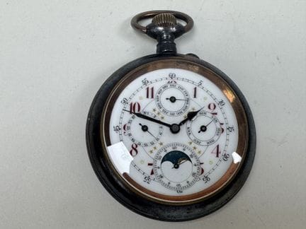 Large metal pocket watch with complications, inclu