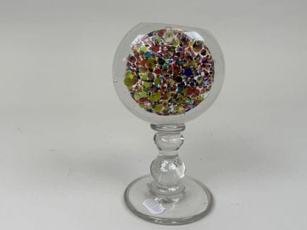 Small wig stand made of polychrome blown glass.
H.