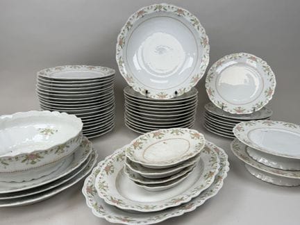 LIMOGES.
A large set of polychrome porcelain table