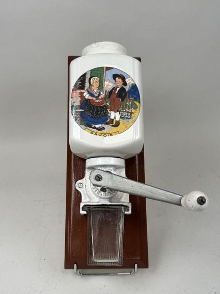 Wall-mounted coffee grinder made of fine, polychro