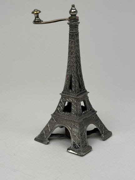 Small silver plated metal pepper mill shaped like 